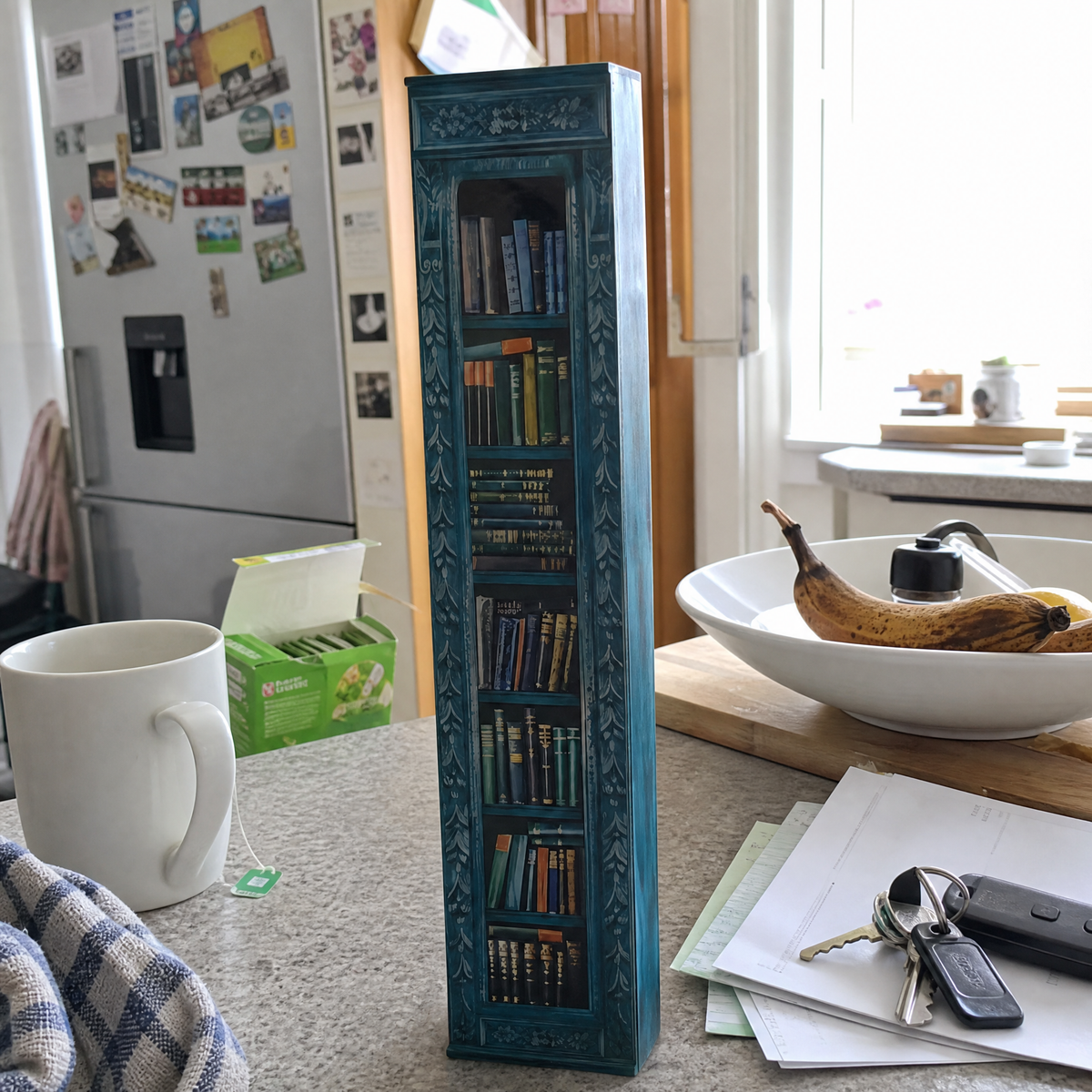 Sprigbound Midwinter Teal advent calendar on a kitchen worktop